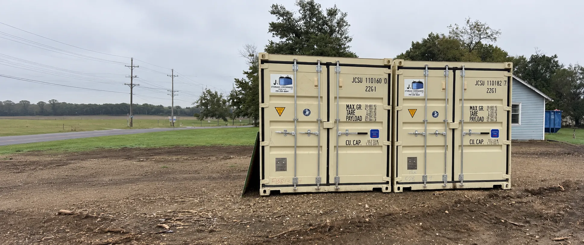 Two new one-trip shipping containers on the lot in Abilene, Kansas